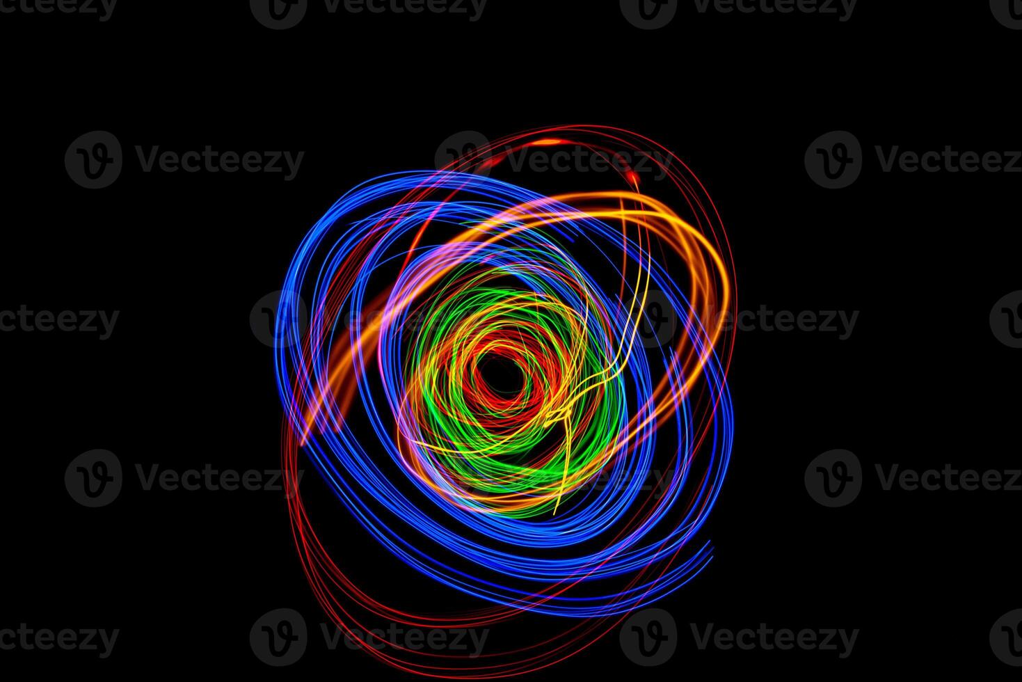 Moving swirls of colored lights photo