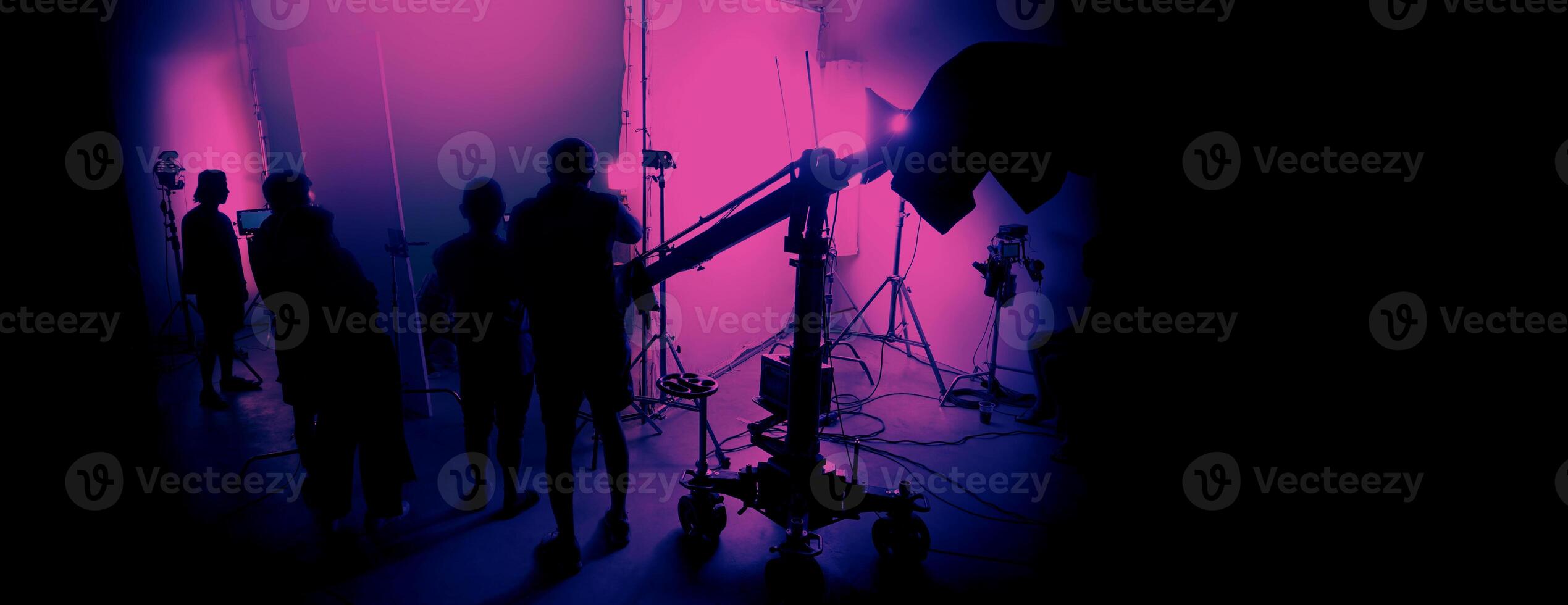 Silhouette images of making of or behind the scenes of video production photo