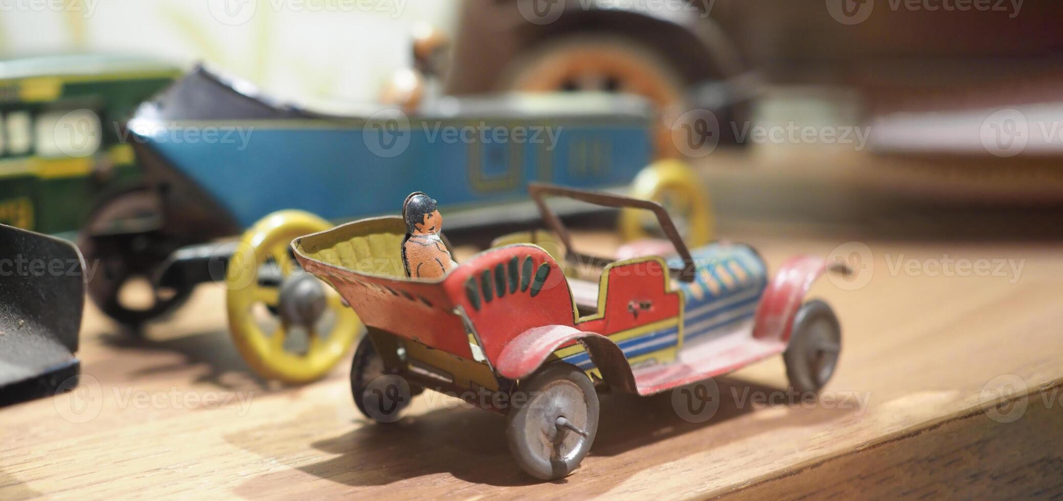 Vintage toy Die cast with galvanized steel such as cars trains. Nostalgic antique metal iron collection of old toy cars. children toys in the past. Old Toy or vintage toys transportation from metal. photo