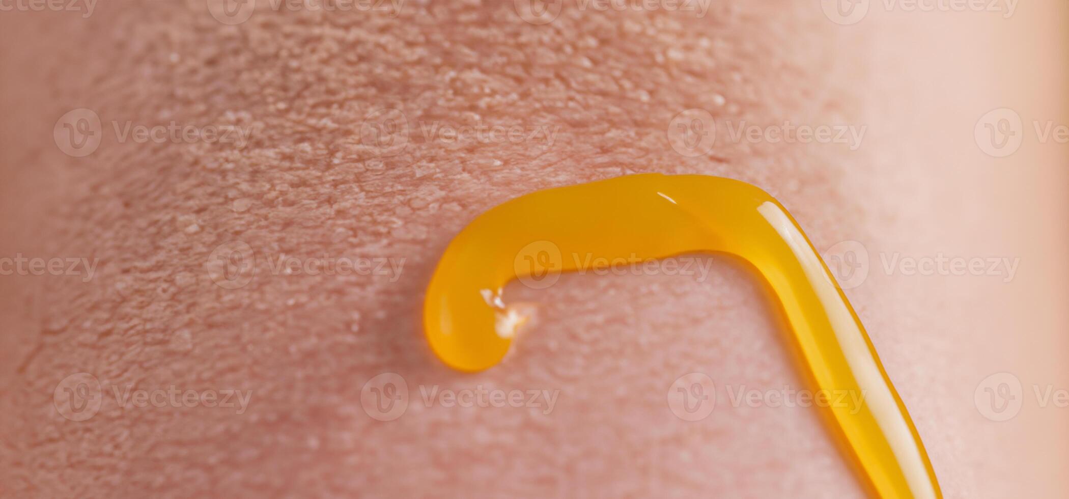 Close up of Sunscreen Protection or Sun Cream on human skin. photo