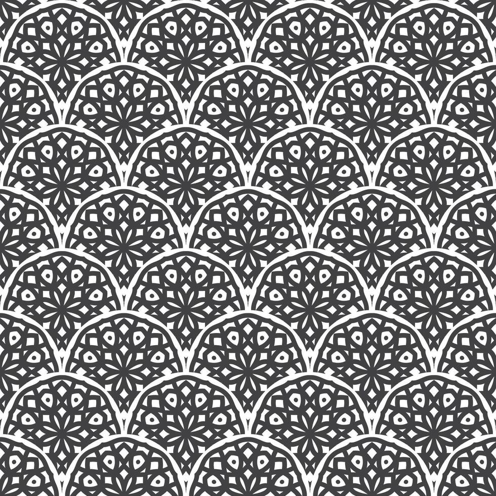 Vector seamless pattern with scales and ornament of mandala. Vector black and white seamless background. The Art Nouveau style. Best for fabric, wrapping paper and home decor