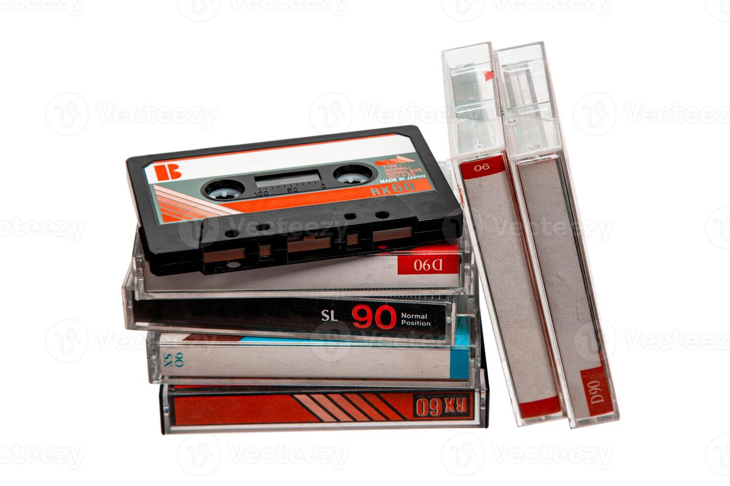 Close-up of many audio tapes. Analog storage medium. Cassettes for audio recordings and music. Isolate on a white back photo
