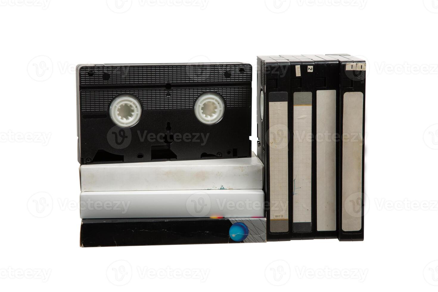 Pile of VHS video cassettes. Vintage media. Isolate on a white back. photo