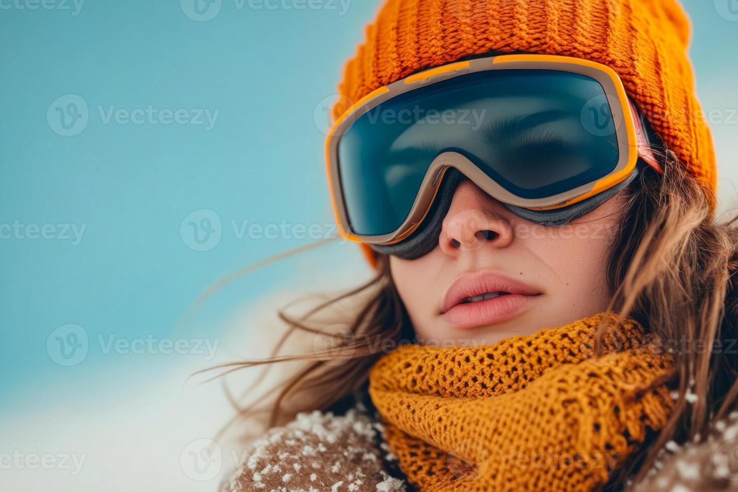 AI generated Woman with large orange scarf covering her face and pair of goggles on top of her head photo