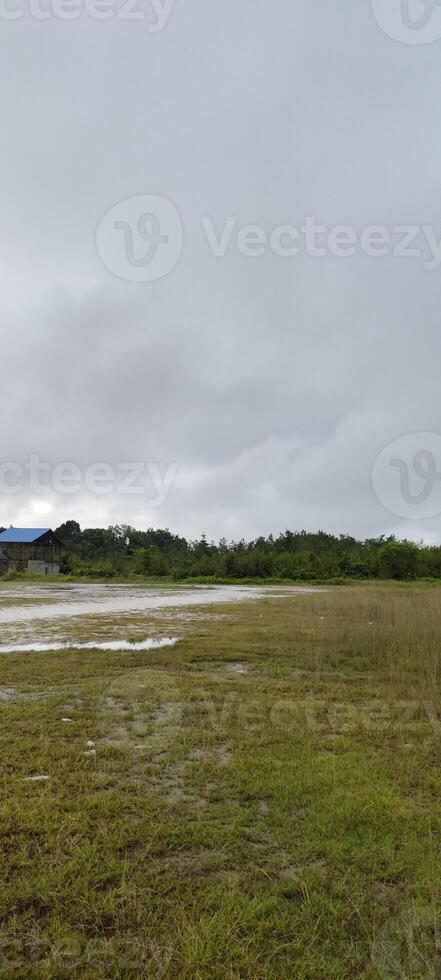 beautiful scene of pitch with cloudy sky photo