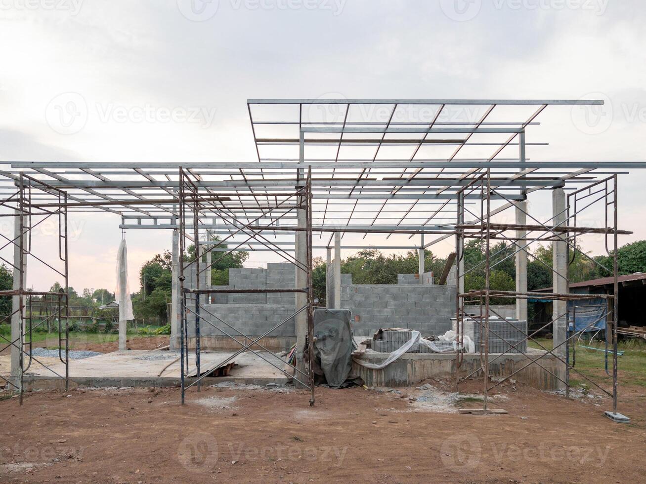 The unfinished house with the many scaffolding. photo