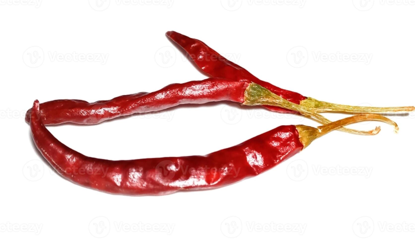 Dry red pepper isolated on white background photo