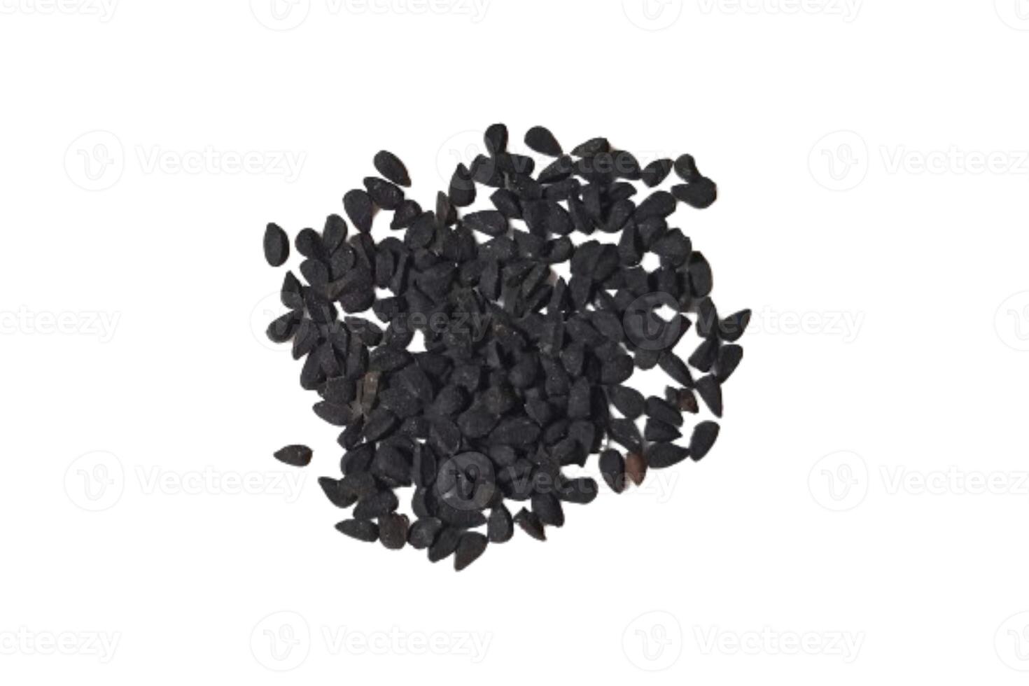 Black cumin seeds pile isolated on white background photo