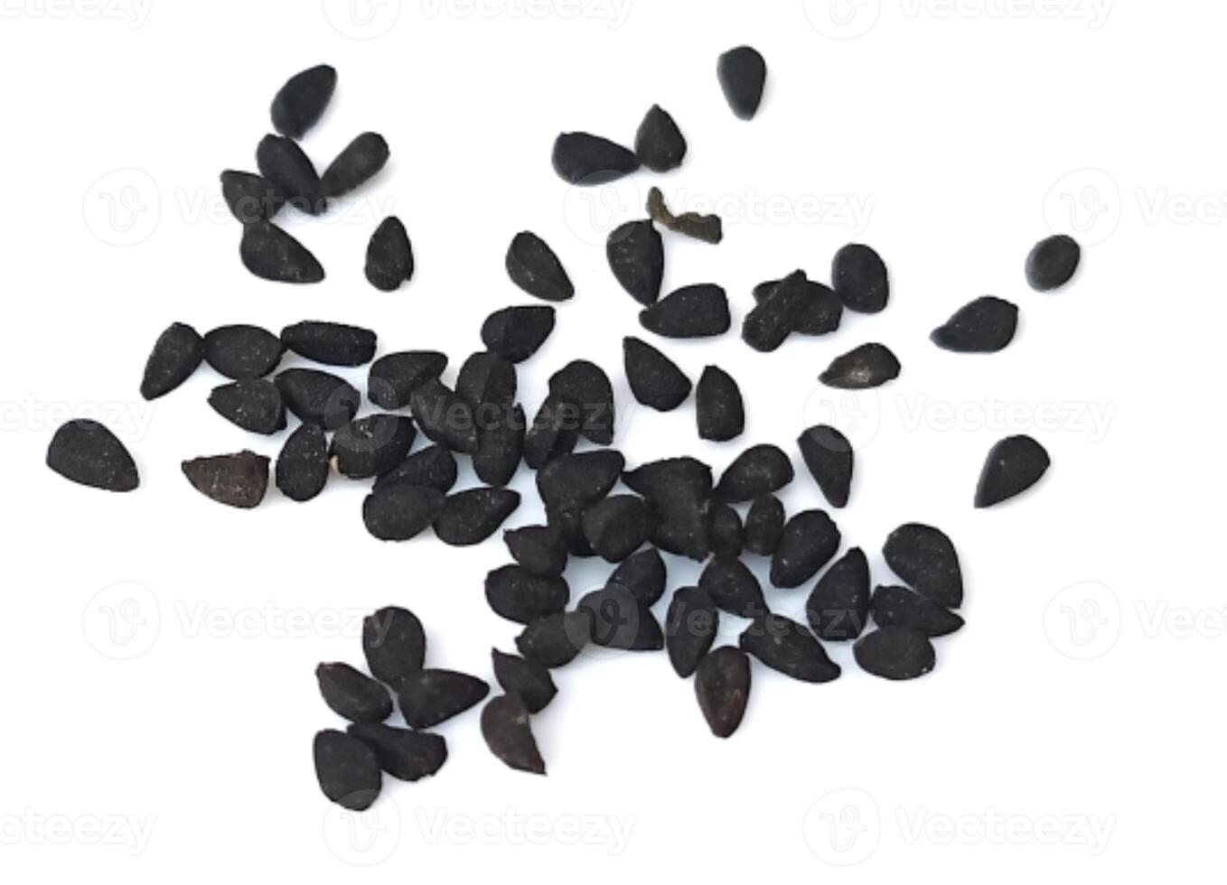 Black cumin seeds pile isolated on white background photo