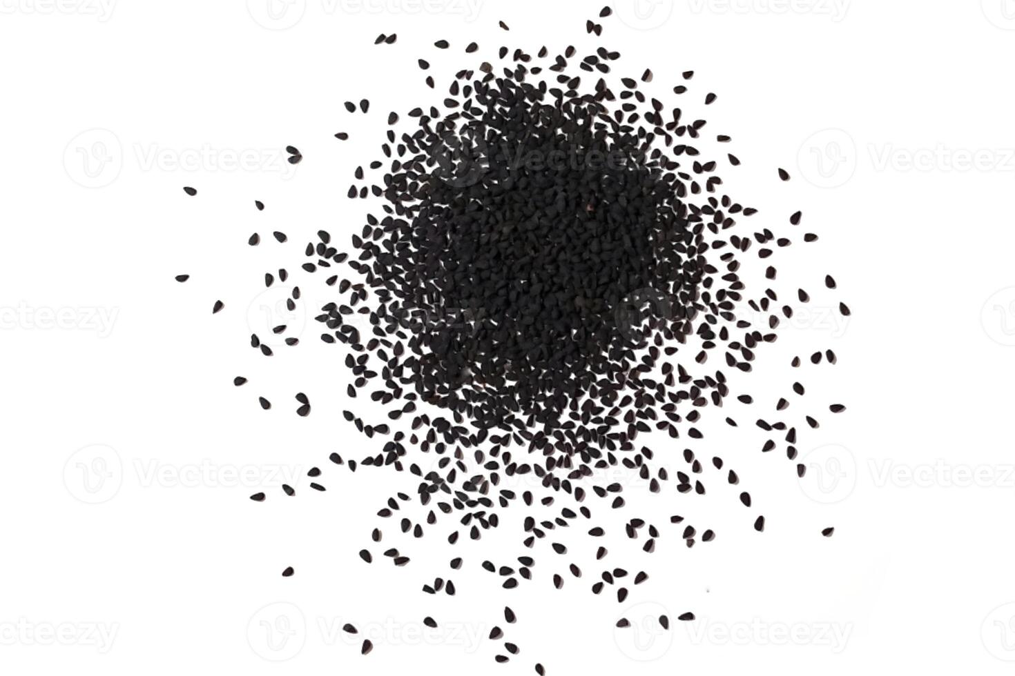 Black cumin seeds pile isolated on white background photo