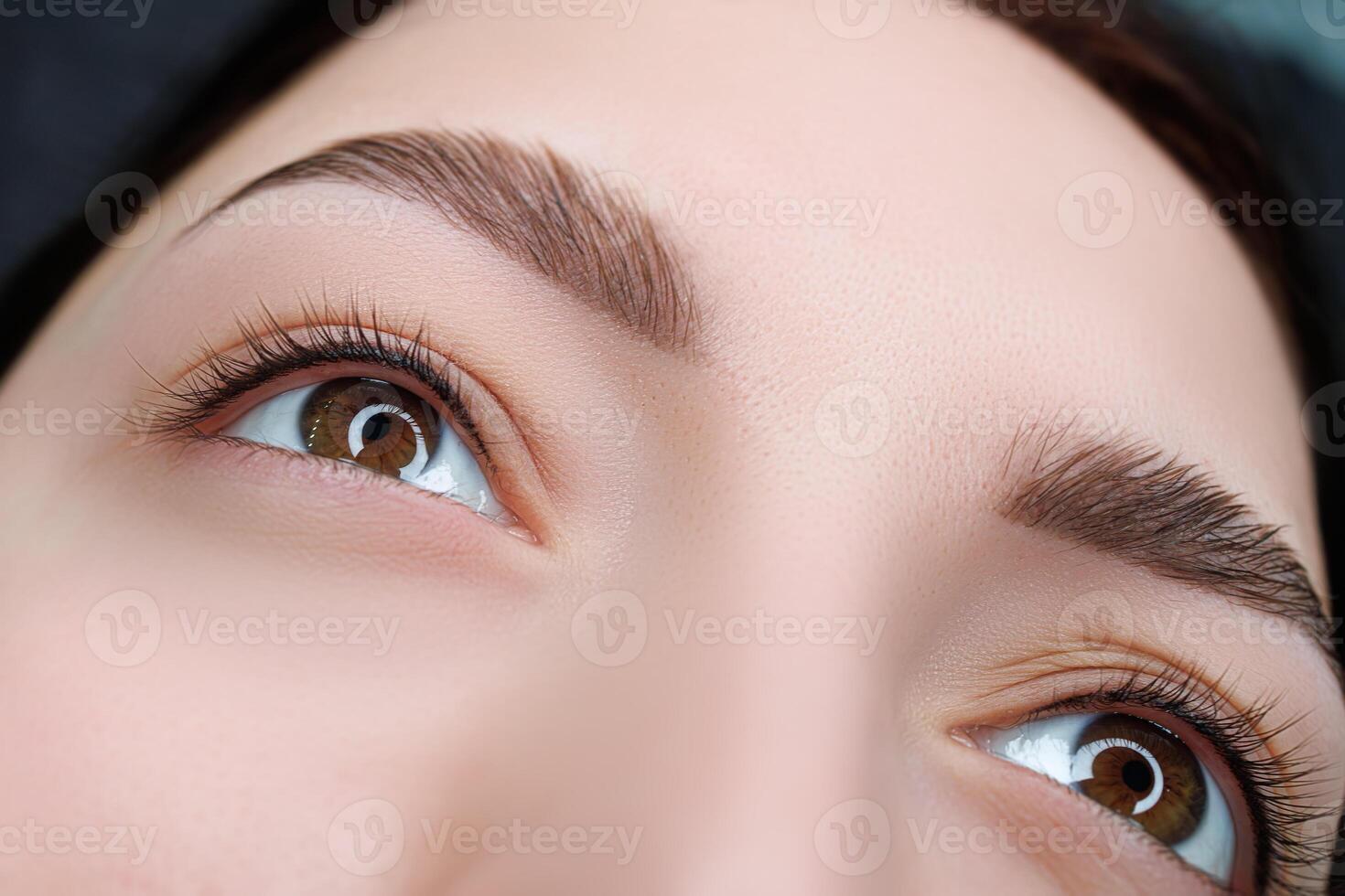Photo after permanent eyelash makeup open eyes with permanent eyelash makeup. Permanent eye makeup and PMU eyelashes