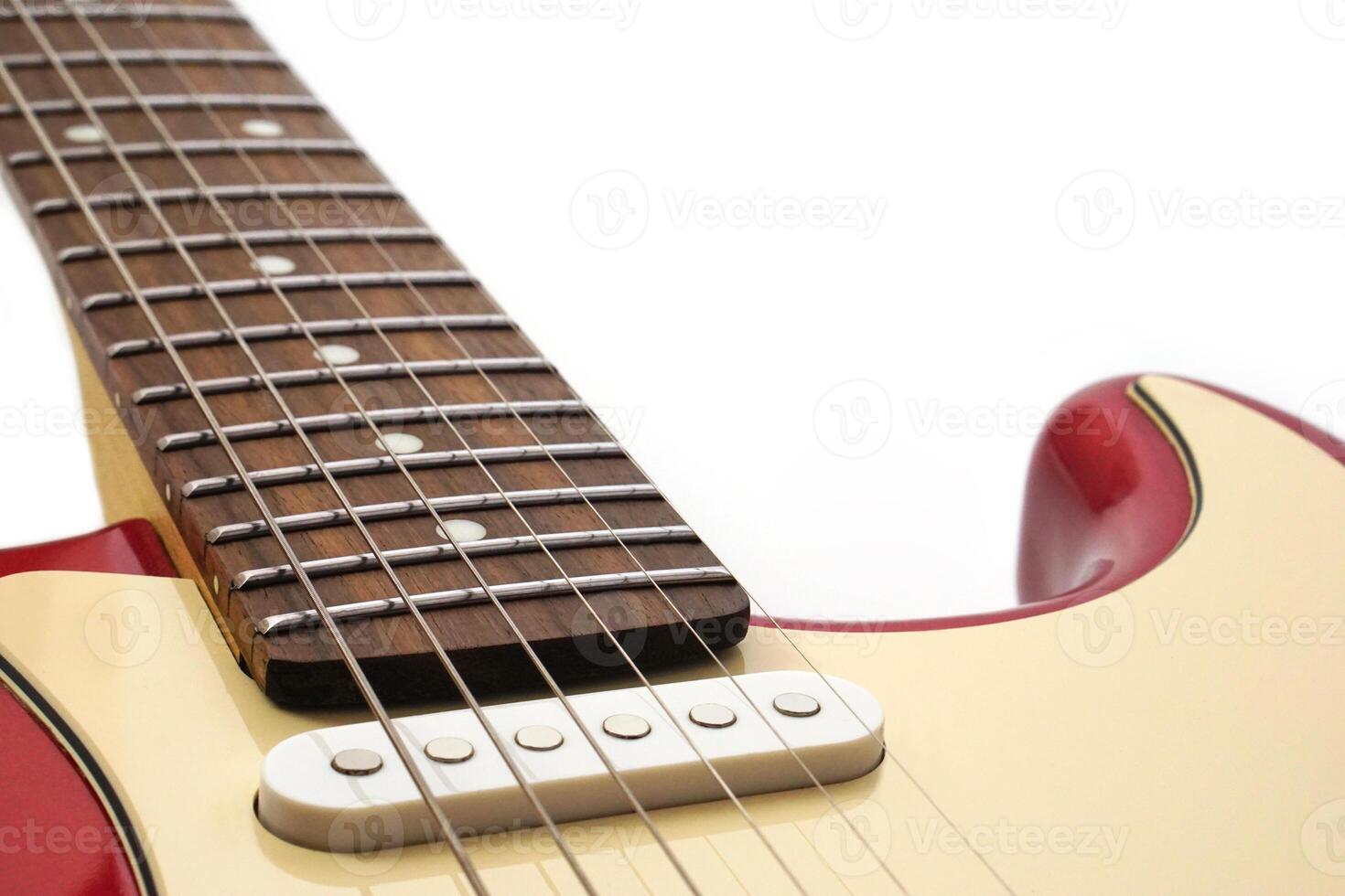 Selective focus, focus acoustic guitar strings on white background with copy space. Love, entertainment and music concept. photo