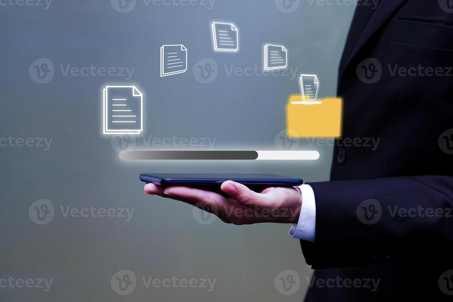 Man working on laptop with holding virtual data transmission icon. Concept of technology and future business. photo