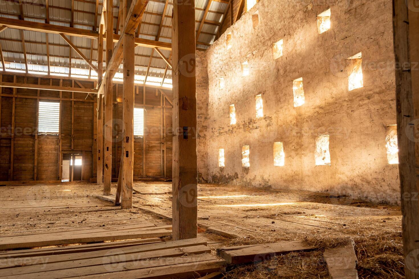 Empty Old Wood Barn Inside Sunbeams Light Rays Boards Dusty photo