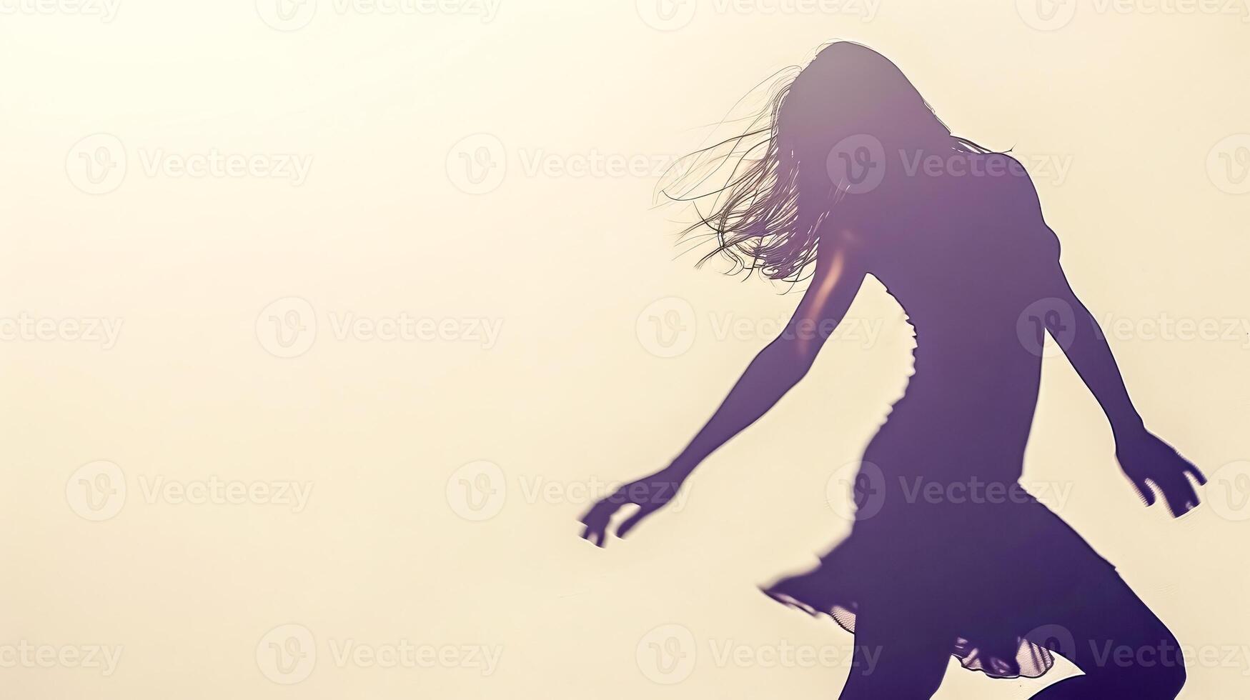 AI Generated Silhouette of a joyful dancing woman at sunset photo