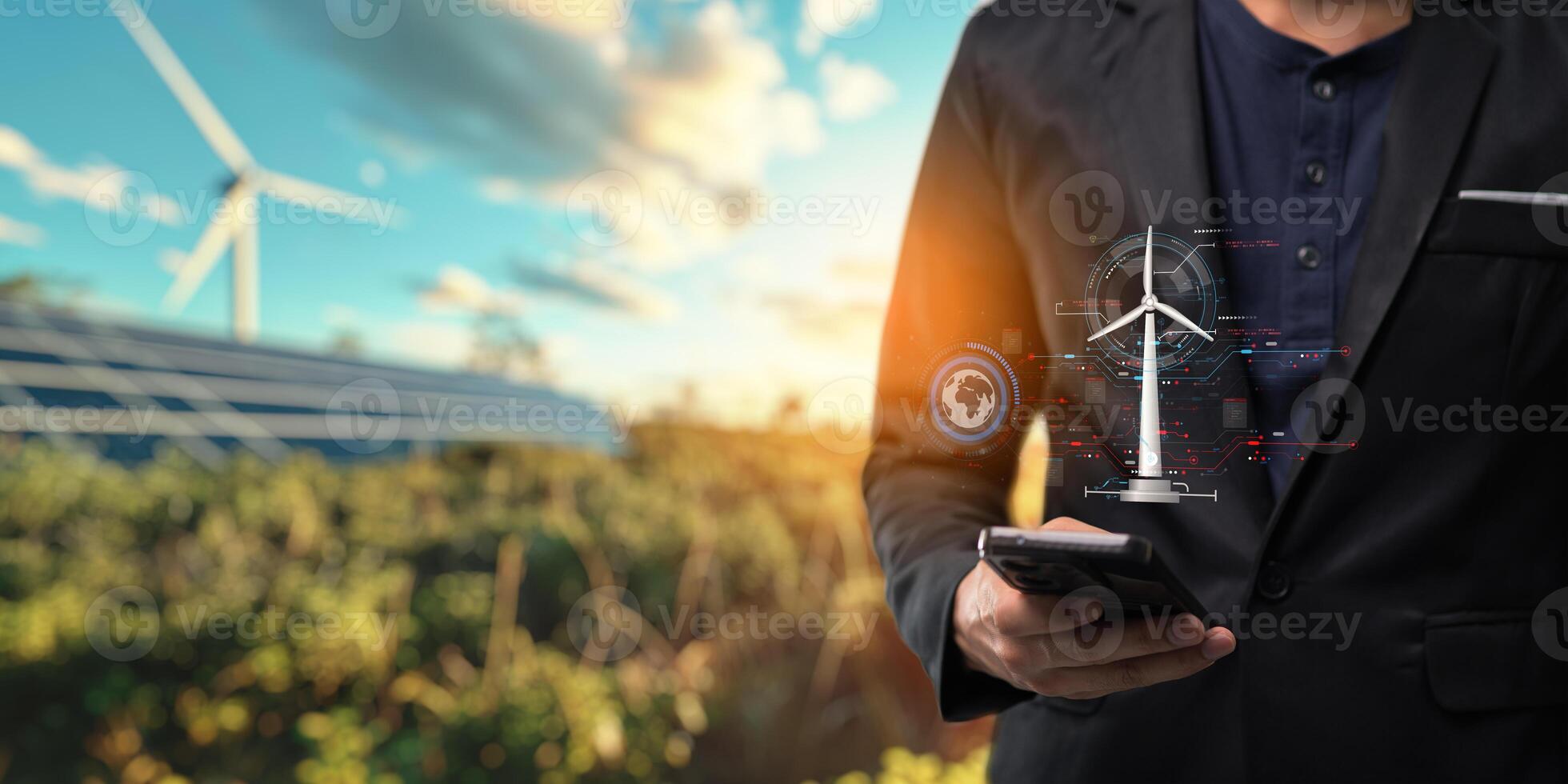 hologram screen Humans controlling the system Wind turbines produce electricity. Eco queue, clean energy from nature. photo