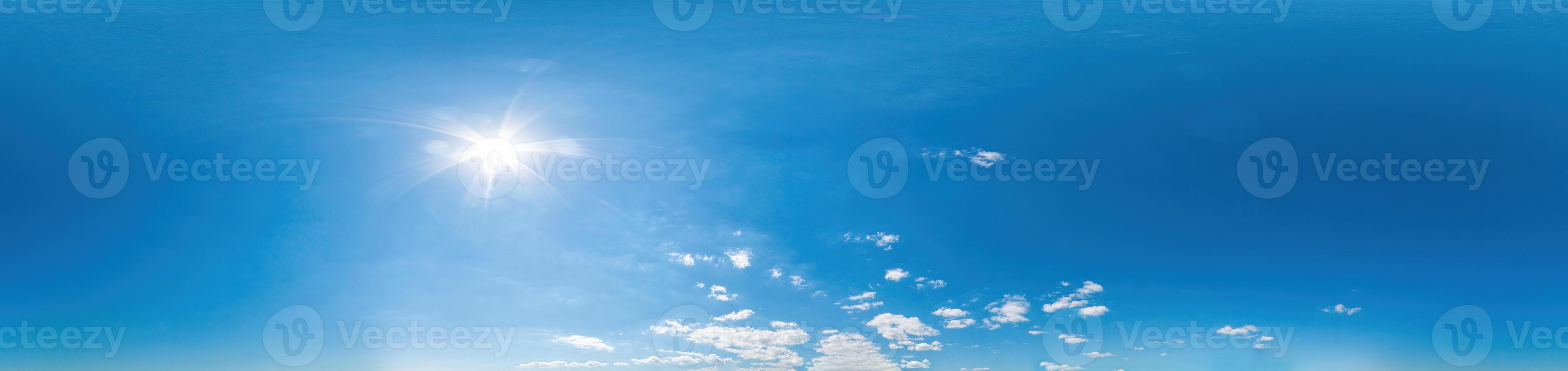 Blue sky with light clouds Seamless panorama in spherical equirectangular format with complete zenith for use in 3D graphics, game and for composites in aerial drone 360 degree panoramas as a sky dome photo