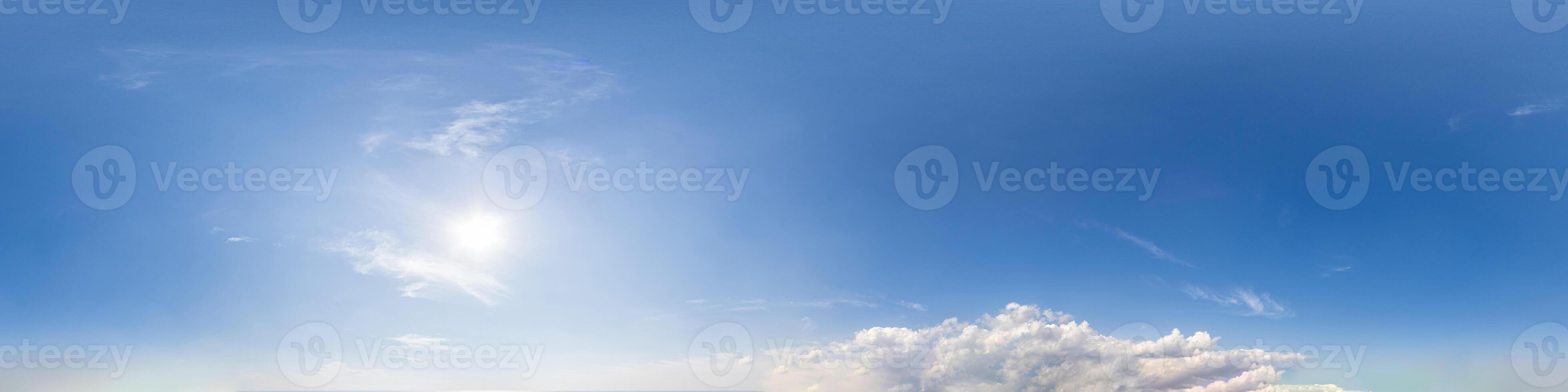 Blue sky with light clouds Seamless panorama in spherical equirectangular format with complete zenith for use in 3D graphics, game and for composites in aerial drone 360 degree panoramas as a sky dome photo