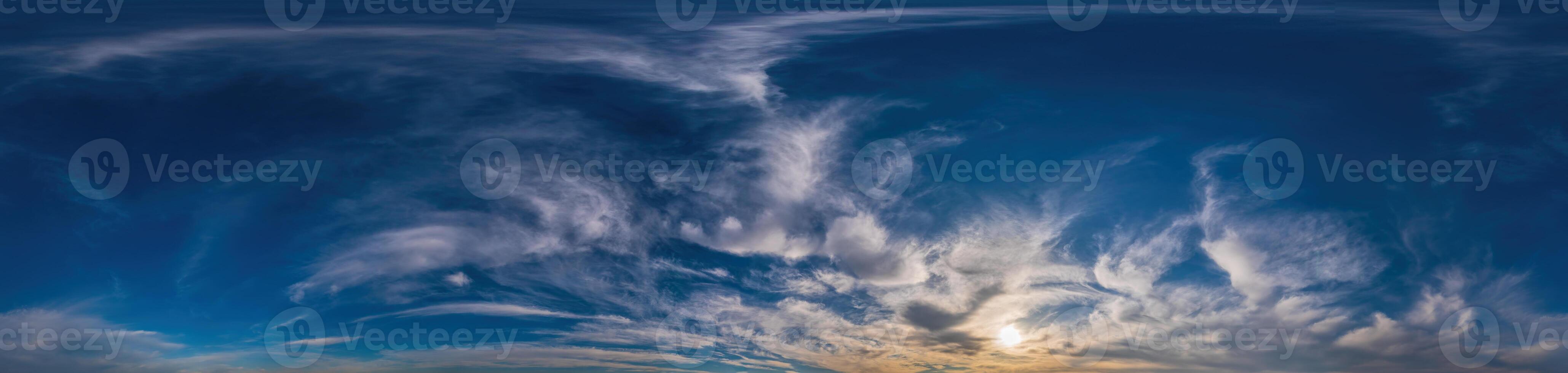 Sunset sky panorama with Cirrus clouds in Seamless spherical equirectangular format. Complete zenith for use in 3D graphics, game and for composites in aerial drone 360 degree panoramas as a sky dome photo