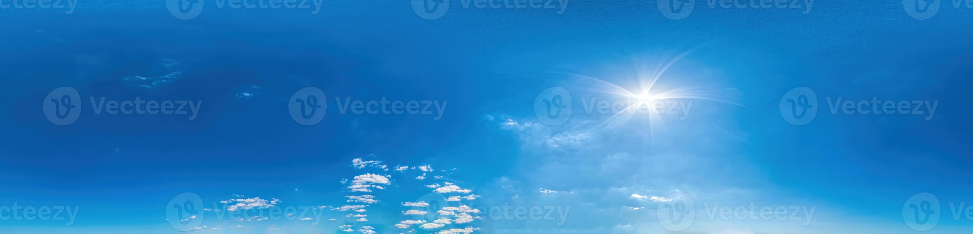 Blue sky with light clouds Seamless panorama in spherical equirectangular format with complete zenith for use in 3D graphics, game and for composites in aerial drone 360 degree panoramas as a sky dome photo