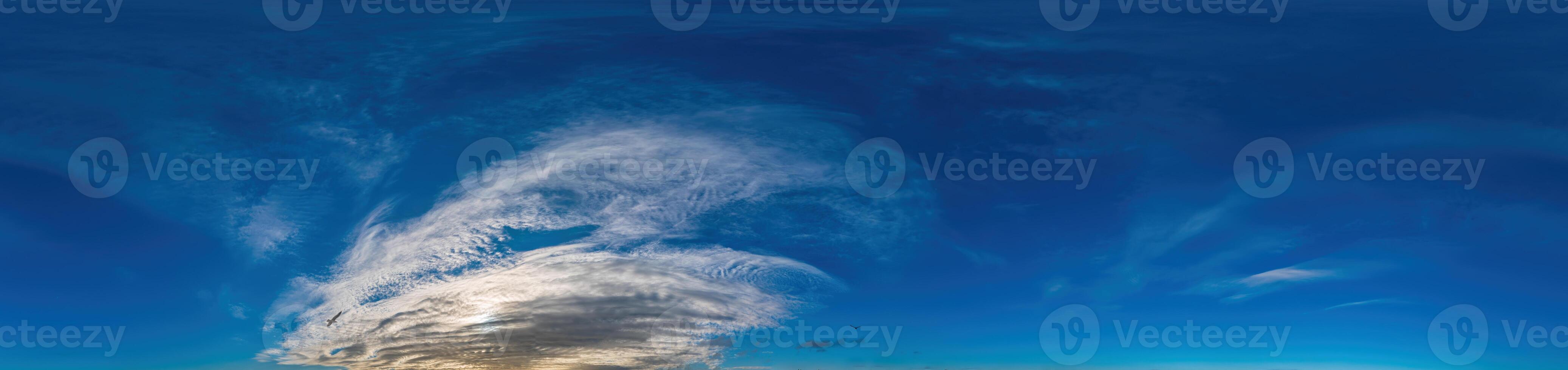 Blue sky with Cirrus clouds Seamless panorama in spherical equirectangular format. Complete zenith for use in 3D graphics, game and for composites in aerial drone 360 degree panoramas as a sky dome photo