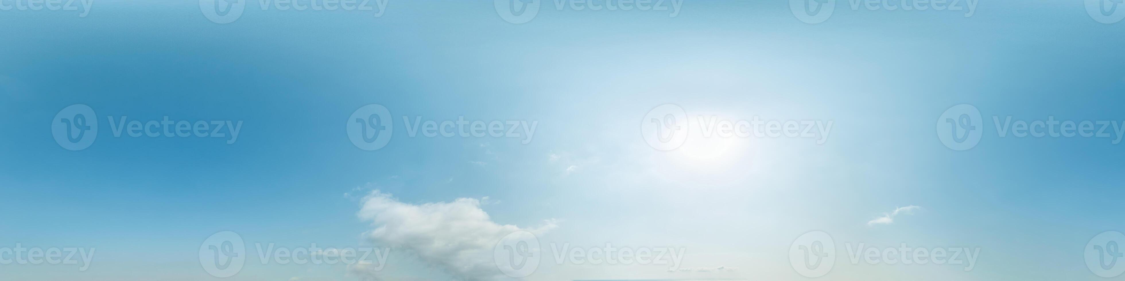 Blue sky with light clouds Seamless panorama in spherical equirectangular format with complete zenith for use in 3D graphics, game and for composites in aerial drone 360 degree panoramas as a sky dome photo