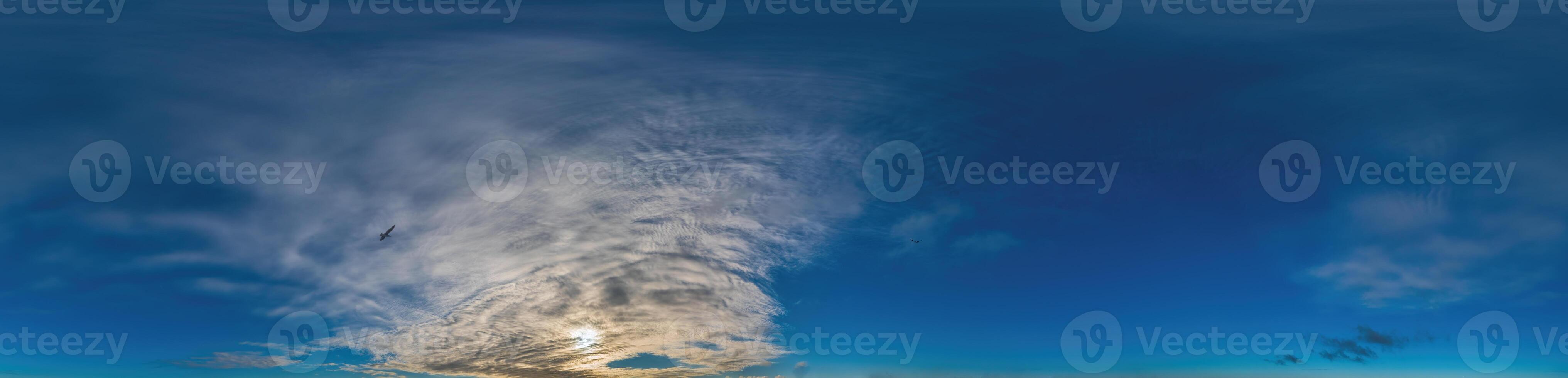 Blue sky with Cirrus clouds Seamless panorama in spherical equirectangular format. Complete zenith for use in 3D graphics, game and for composites in aerial drone 360 degree panoramas as a sky dome photo