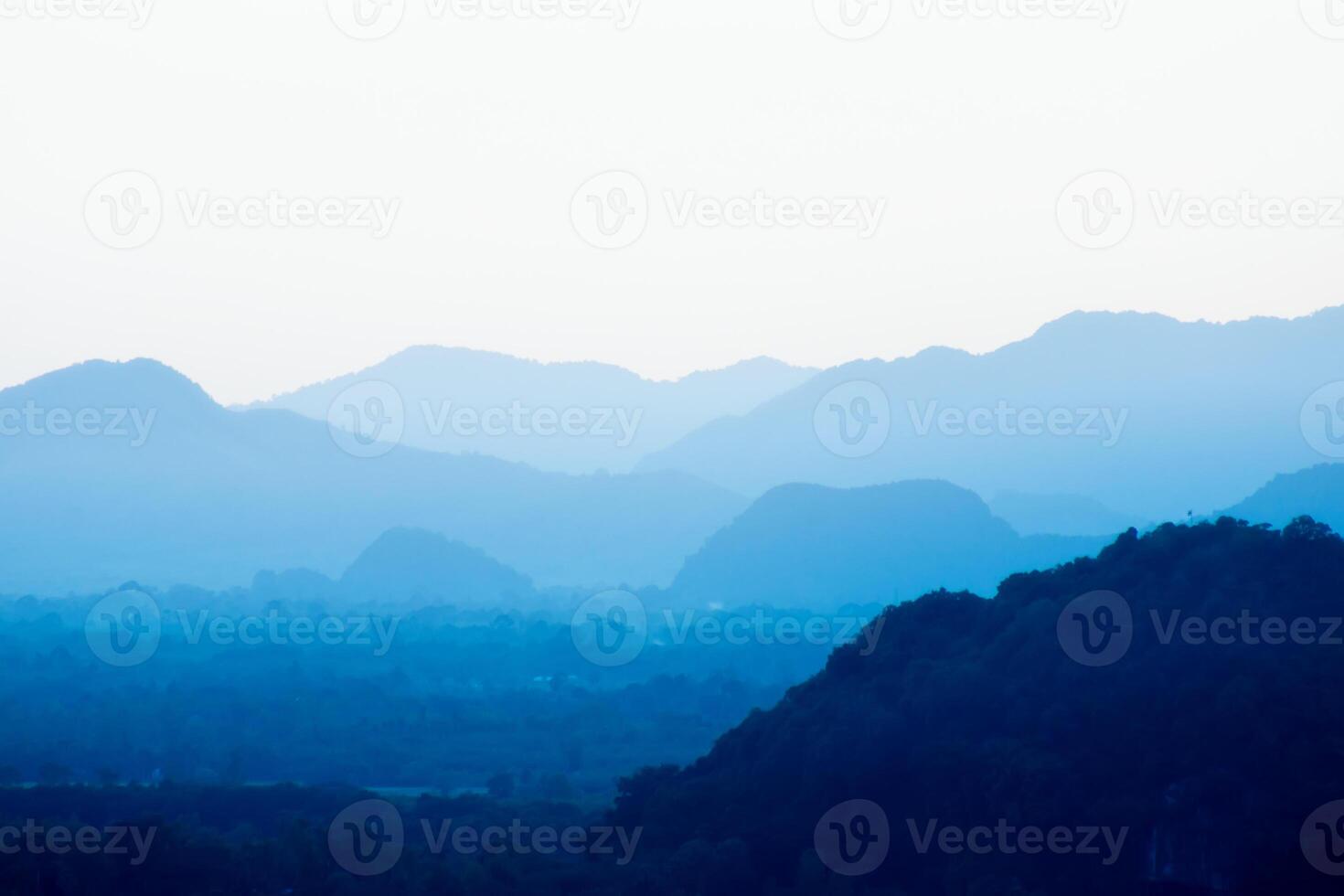 Blue layer of the mountain in the morning. photo