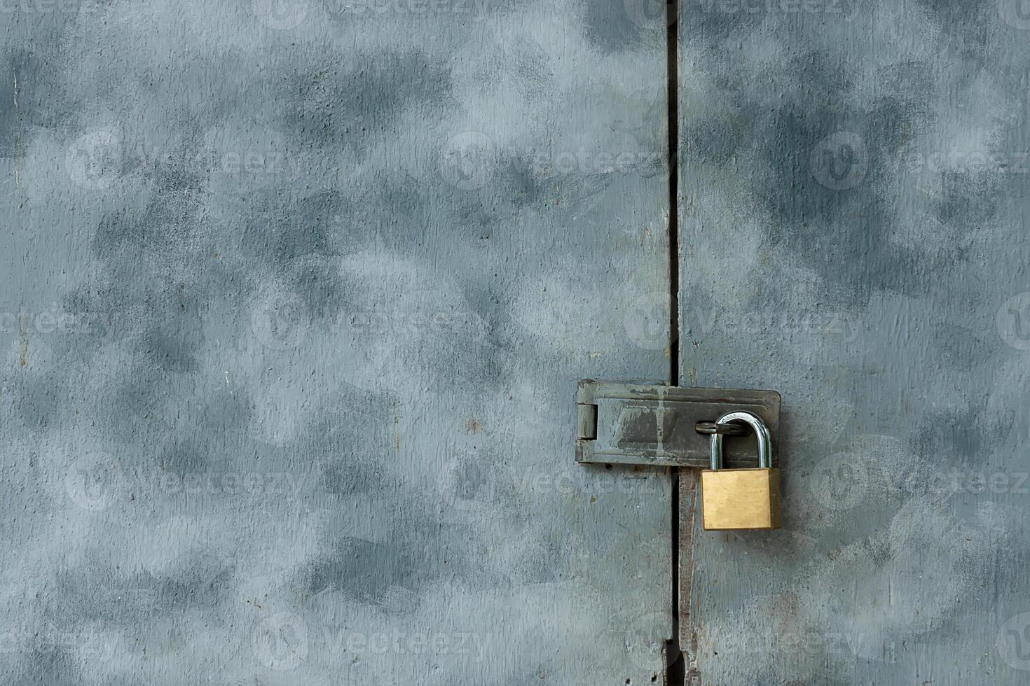 Old keys on painted wooden doors. photo