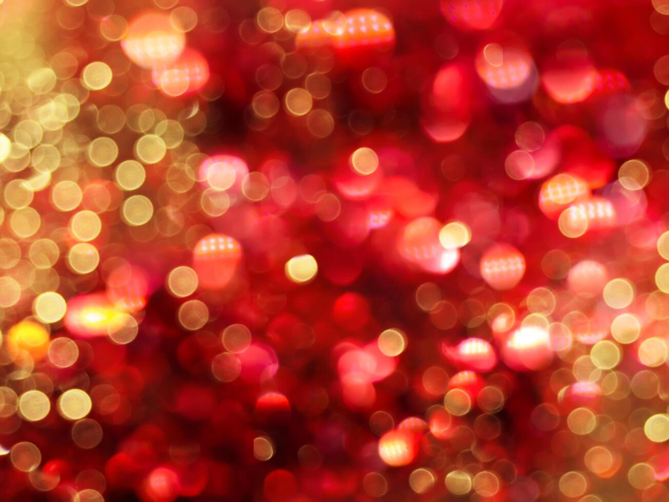 Gold light bokeh on blur red background photo