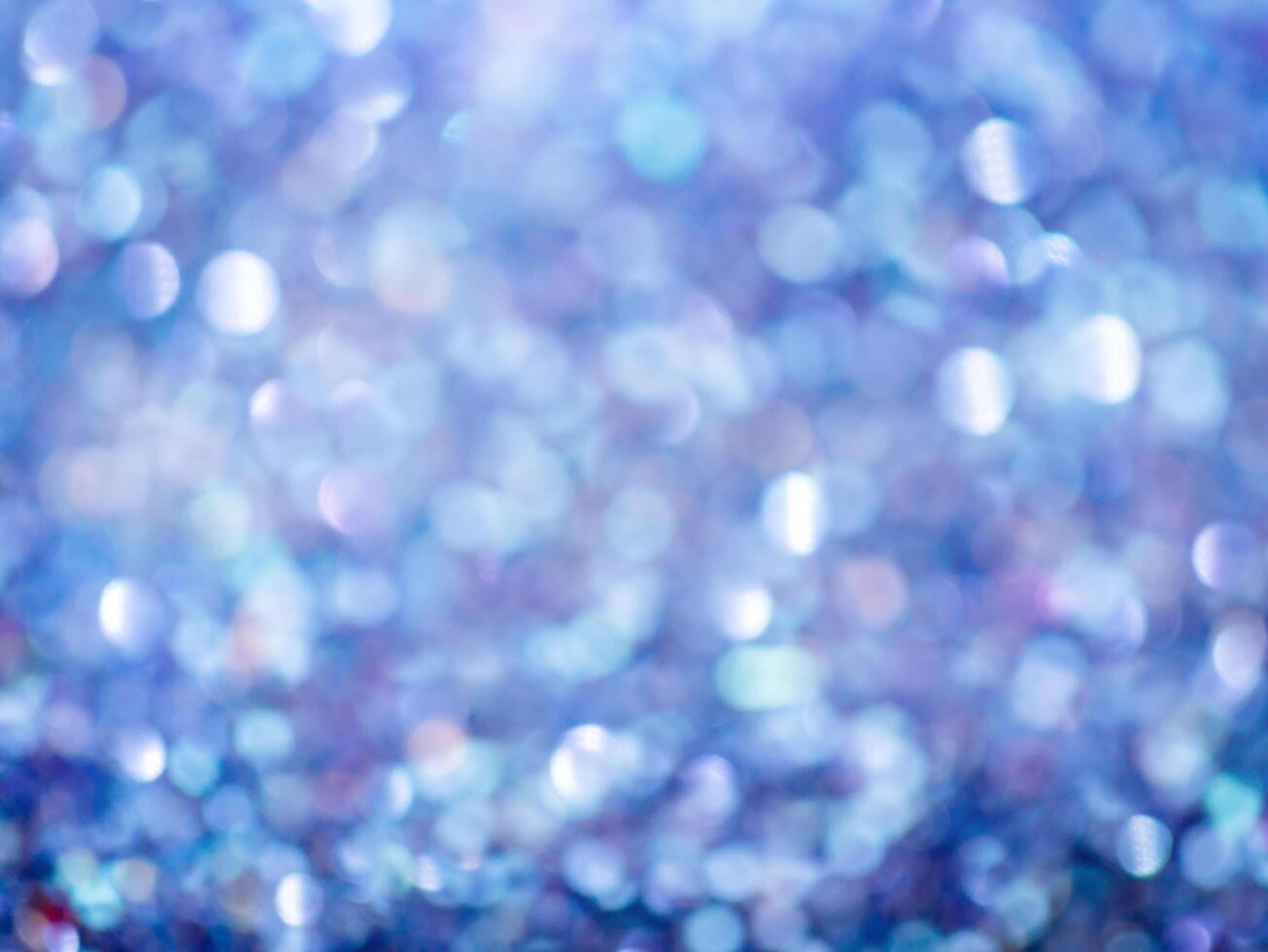 Blue sparkling glitter bokeh background. photo