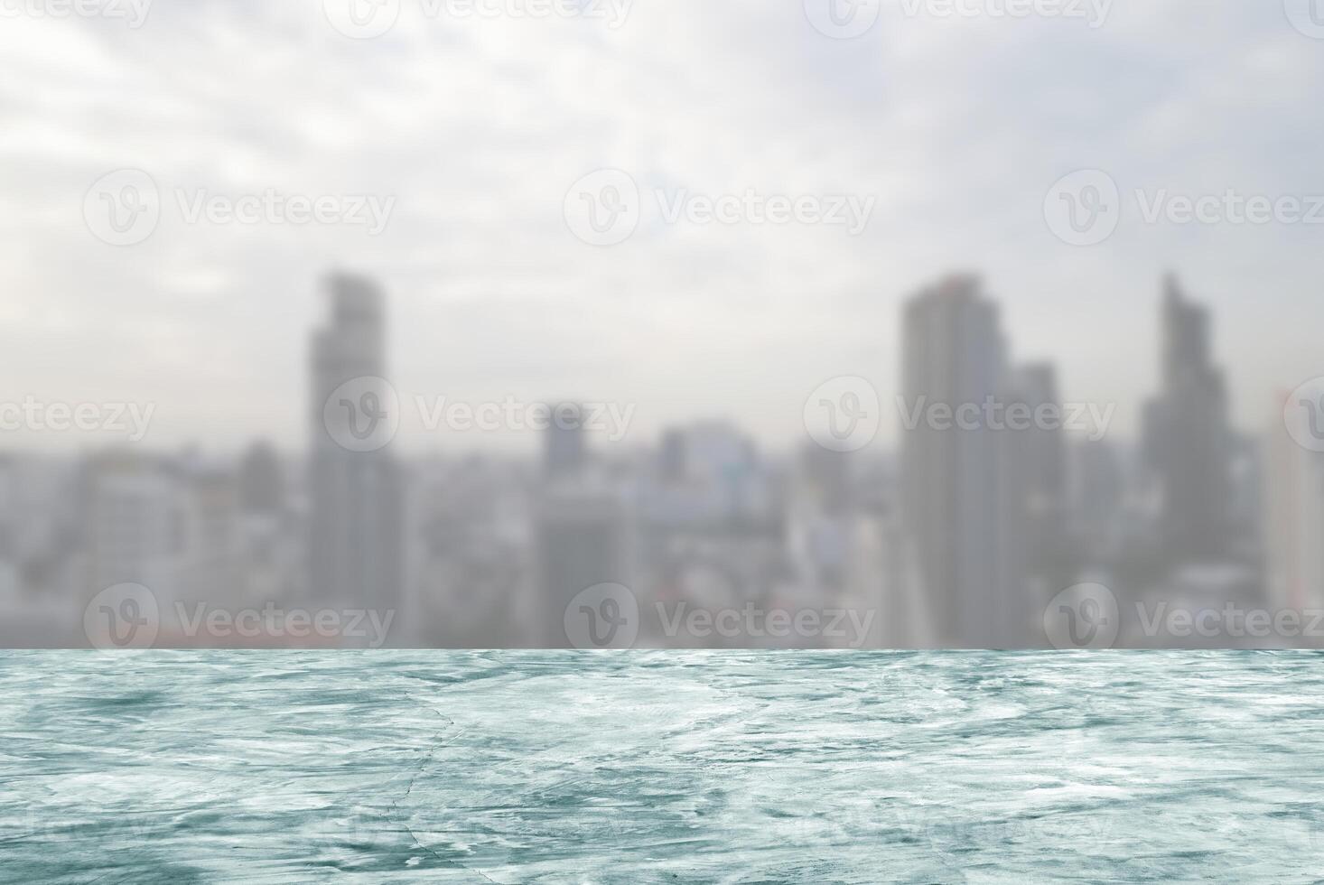 White Concrete Floor with Blurred Scenery of Cityscape Background. photo