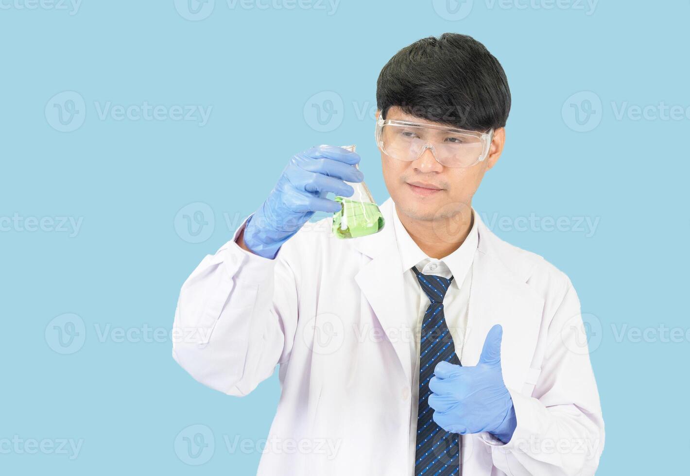 Asian man student scientist or doctor in reagent mixing laboratory In a science research laboratory with test tubes of various sizes. on the floor in  laboratory chemistry lab blue background. photo