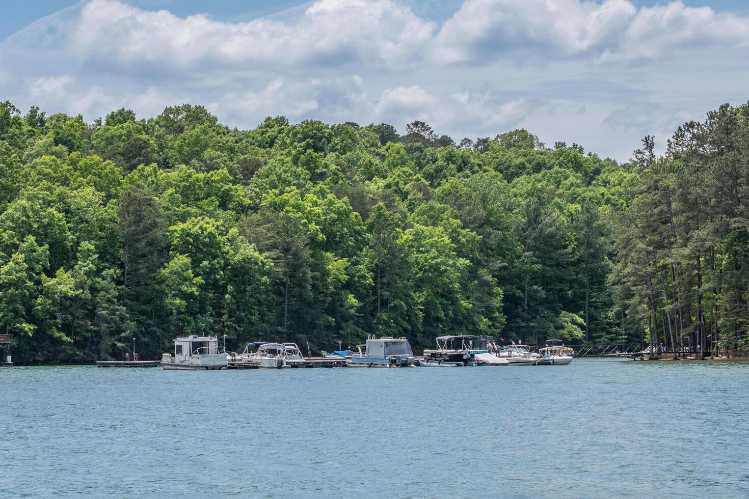 Boats at the dock on the lake photo