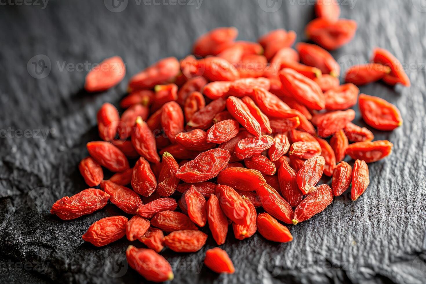 AI generated Fresh Goji berries on dark rough stone table. photo