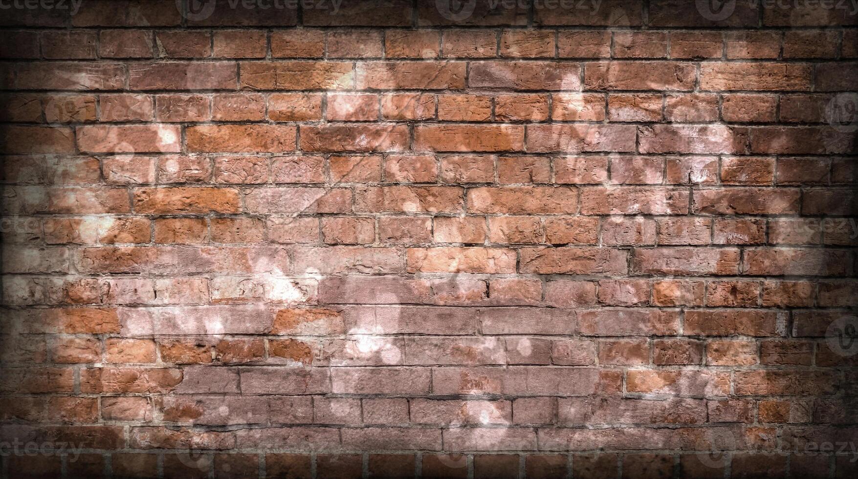 Aged and weathered old brick wall texture in a retro vintage design photo