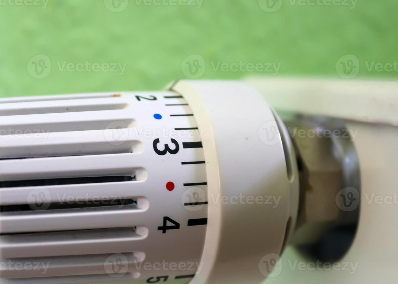 Close-up view of a heater thermostat. photo