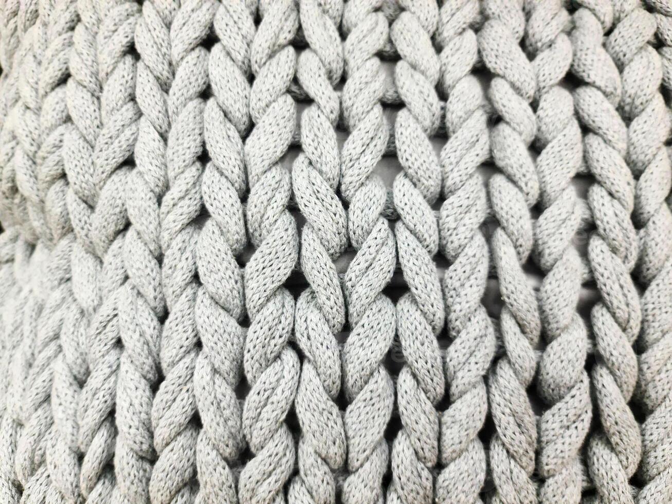 Detailed close up view on samples of cloth and fabrics in different colors found at a fabrics market photo