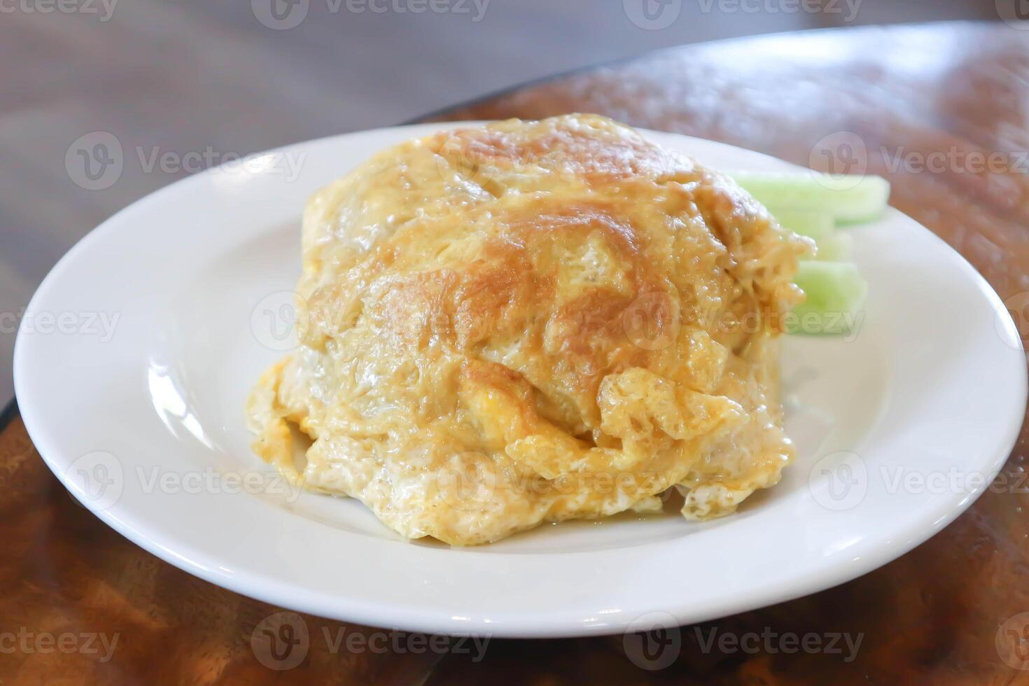 omelette, omelet or deep fried egg and rice photo