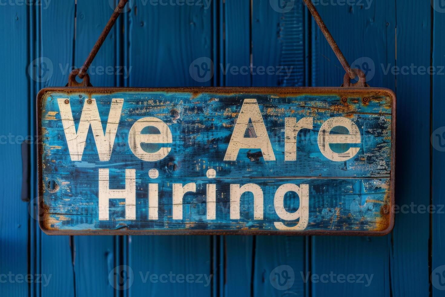 AI generated A vibrant We Are Hiring sign hanging on a wall, beckoning potential candidates to join the team with its bold design and welcoming message. photo