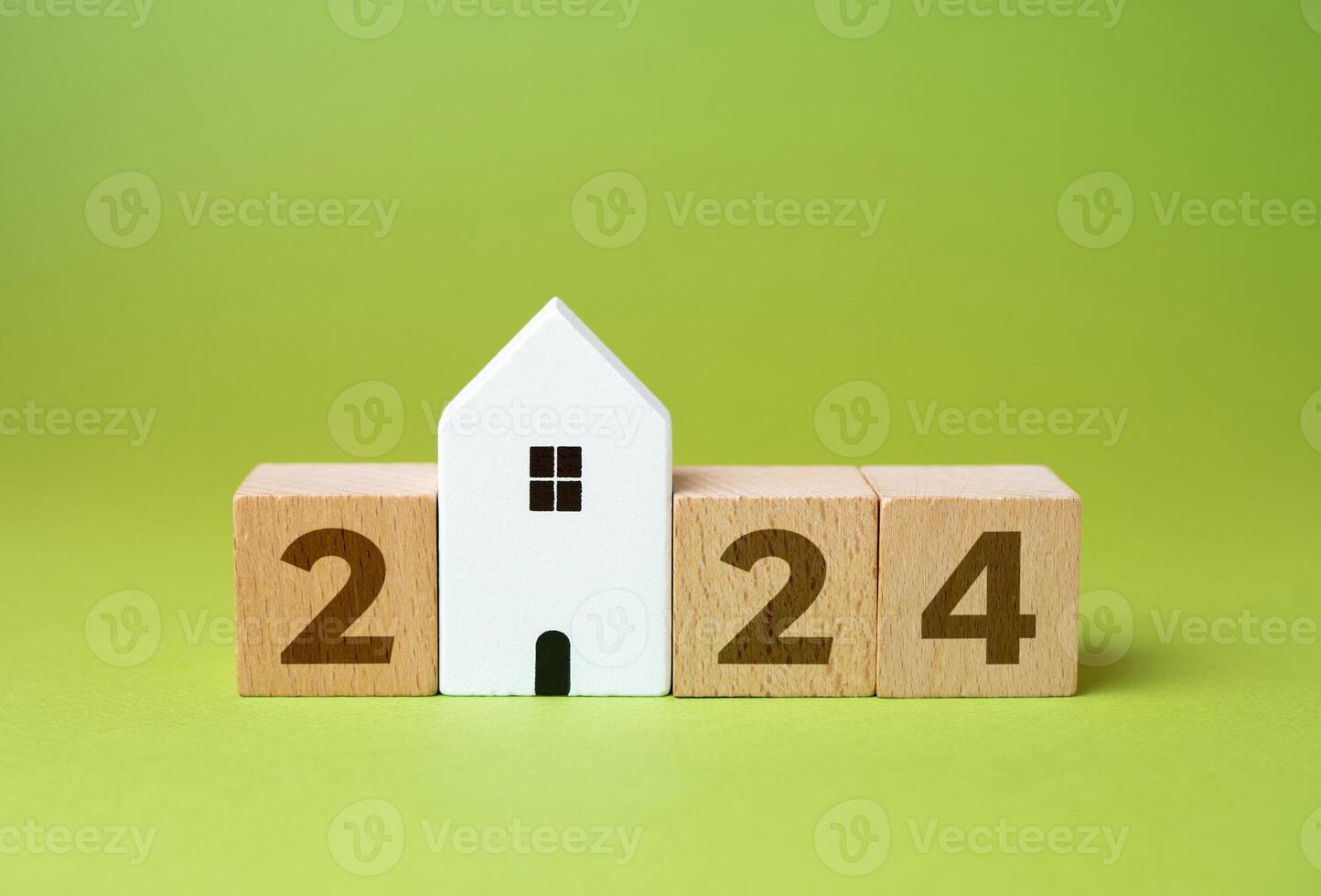 Home and 2024. Family budget planning for next year. Mortgage rates and credit. Real estate fund concept. Refinance home. photo