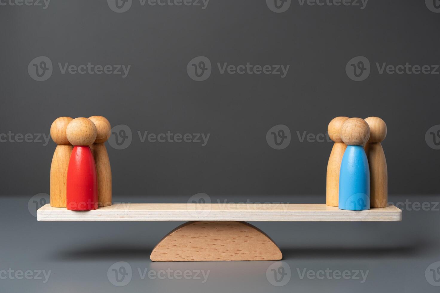 Two opposing teams on the scales. Rivalry between groups and leaders. The state and parties. Two major political parties. Democratic elections. photo