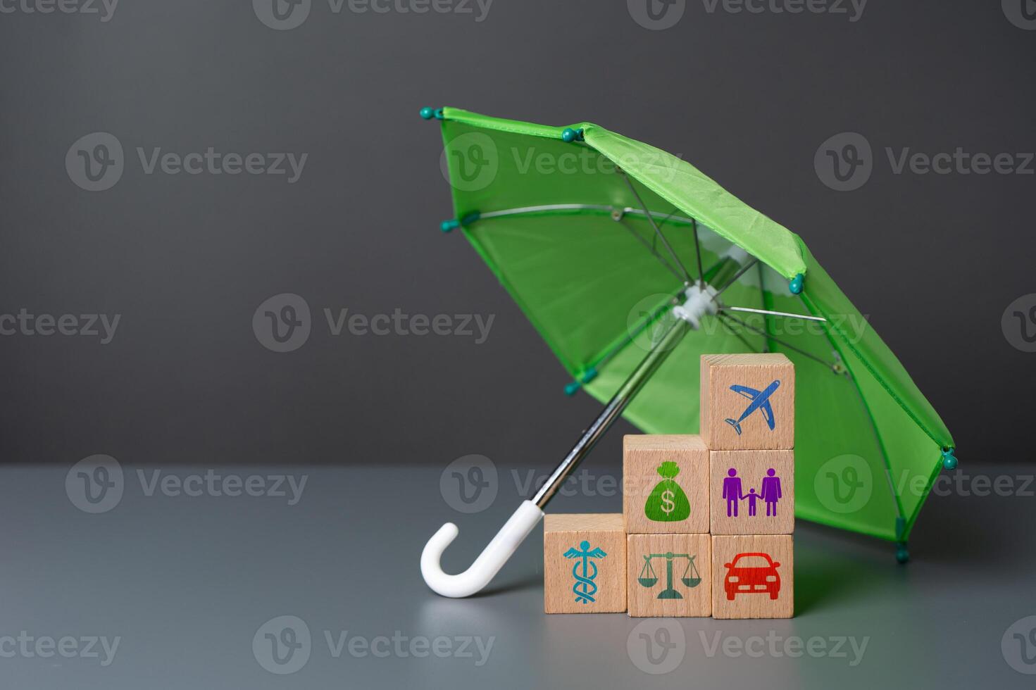 Insurance services under the umbrella. Comprehensive insurance coverage encompass a wide range of risks, including accidents, natural disasters, theft, and other unforeseen events. Scope of protection photo