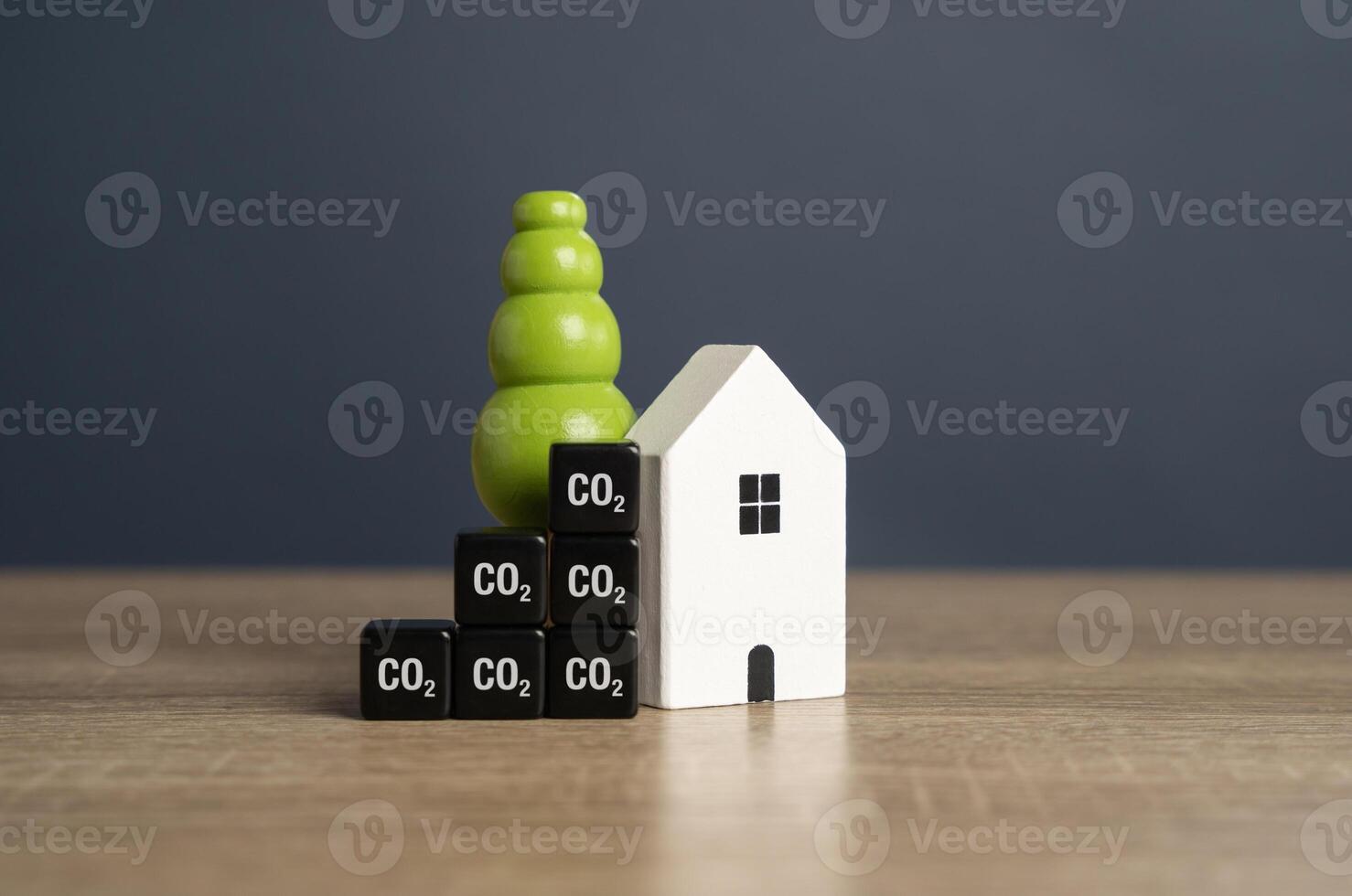 House and CO2 metric cubes. Energy efficiency. Reduce a homes carbon footprint and energy consumption. photo