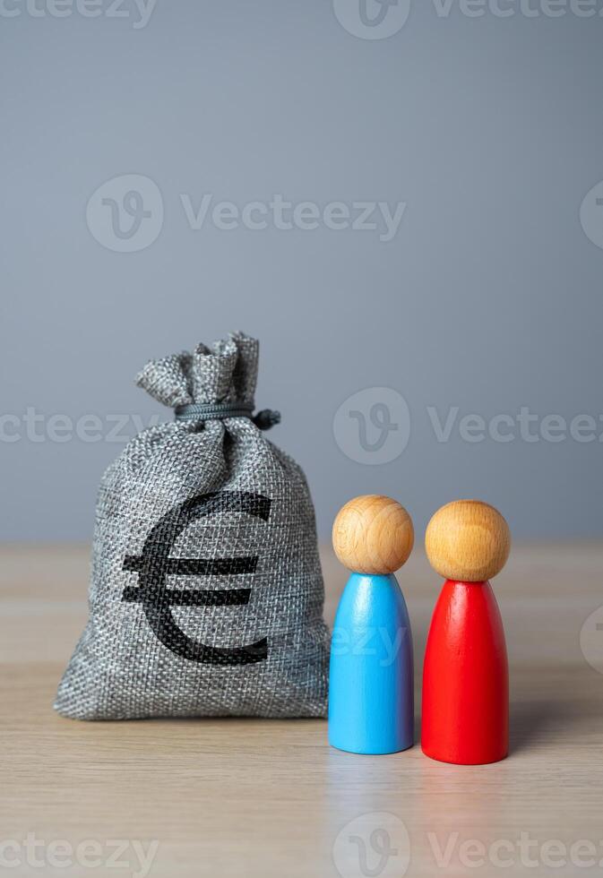 Dispute regarding the division of money. Euro money bag. Resolution of the dispute through the court. Business partnership. Search for a compromise. Mediation of conflicting parties. photo