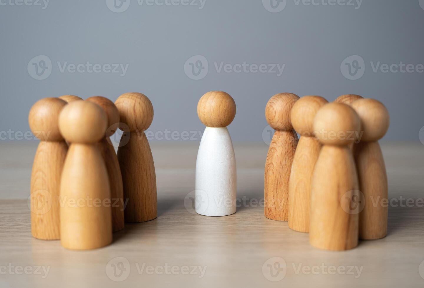 An authoritative leader and a crowd of people figures. Get people to join you. Business management, human resources. Collaboration. photo
