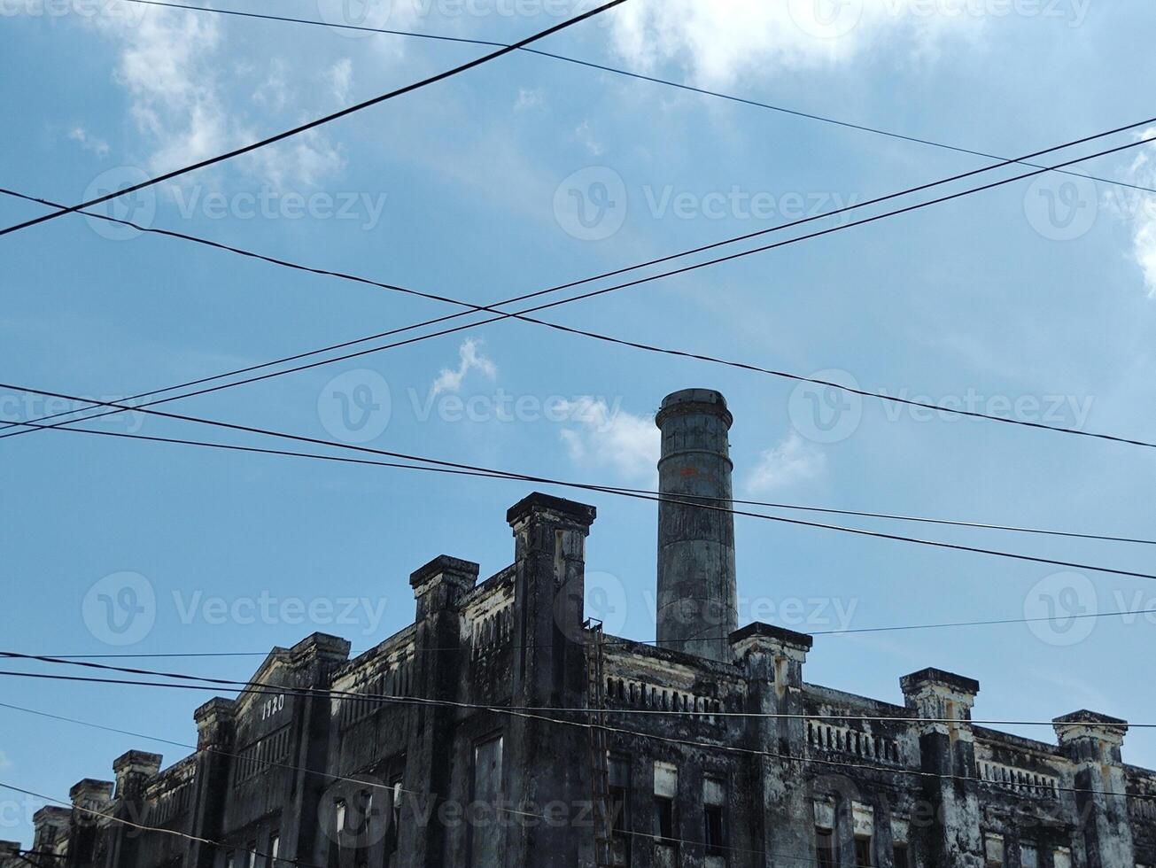 The Heritage Palace with blue sky and cables in Surakarta, Indonesia. photo