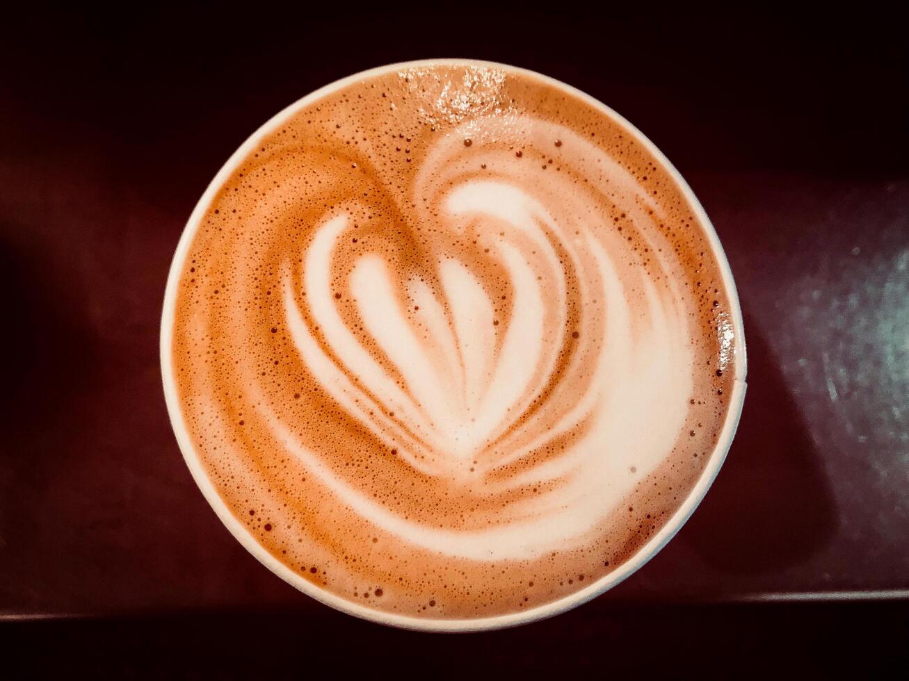 café con corazón latté Arte foto