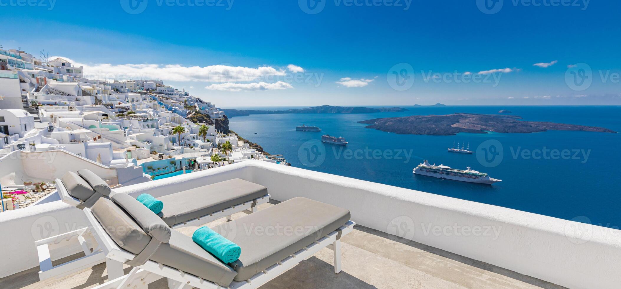 Luxury resort in Santorini. Loungers on caldera with pools and white architecture. Summer vacation and holiday banner. Greece traditional island and sea view. Luxurious travel background photo