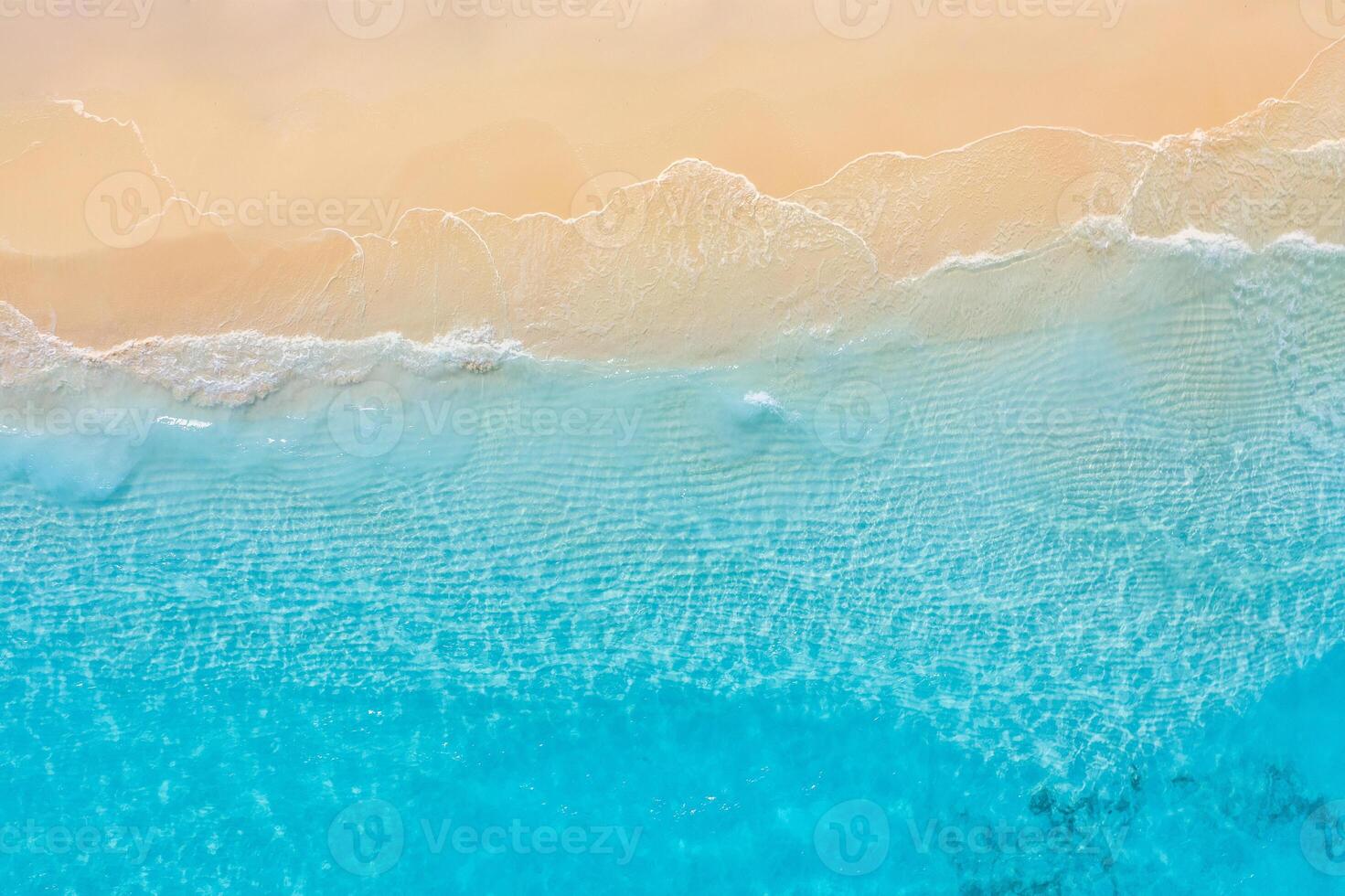 Relaxing aerial beach scene, summer vacation holiday template banner. Waves surf with amazing blue ocean lagoon, sea shore, coastline. Perfect aerial drone top view. Peaceful bright beach, seaside photo